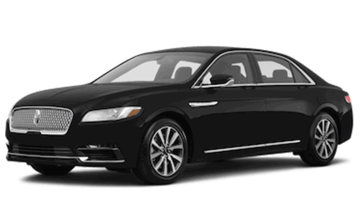 Home 1 A black, four-door luxury sedan viewed from the front passenger side, featuring chrome accents and alloy wheels—perfect for a premium airport transfer or as an executive car service.